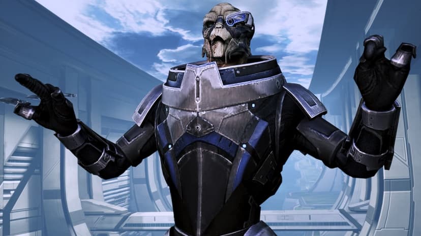 Garrus Vakarian in blue and silver armor standing on the Citadel Presidium against a bright blue sky background.