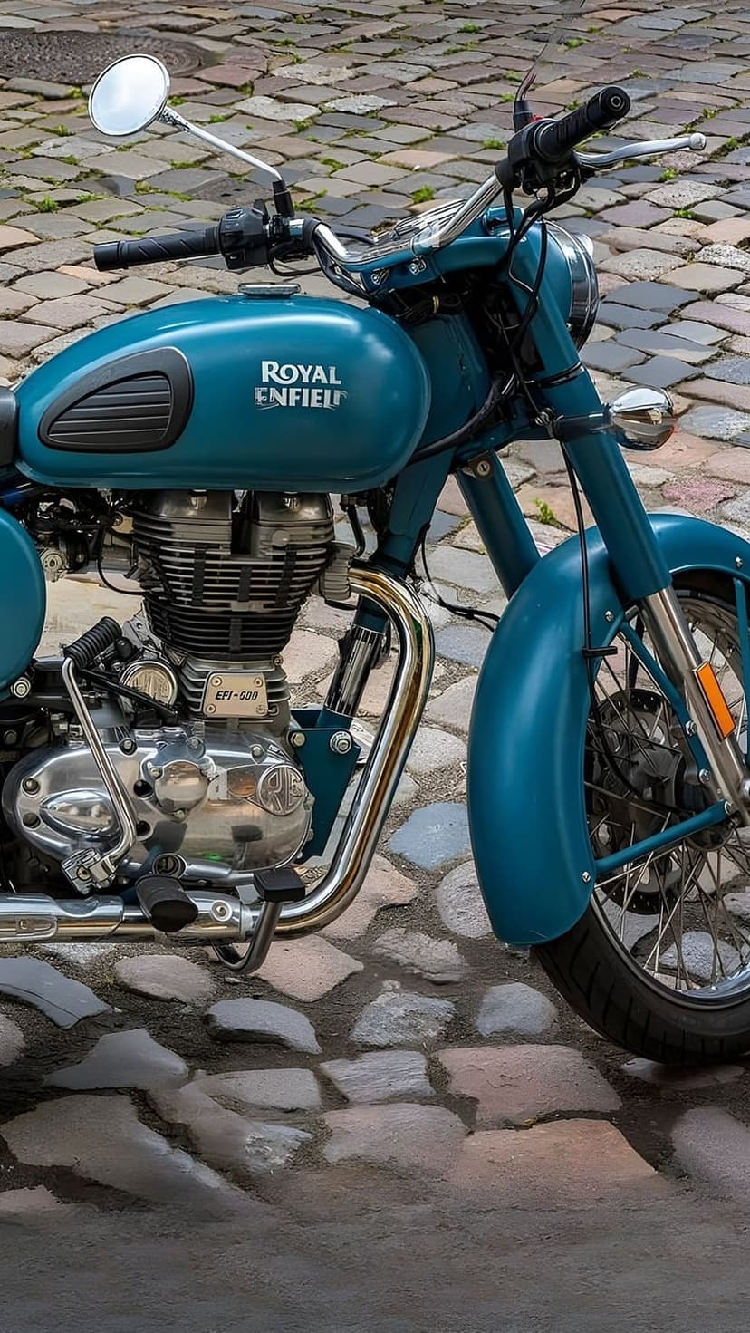 Teal Royal Enfield motorcycle with chrome accents on wet cobblestones featuring the iconic fuel tank and logo.