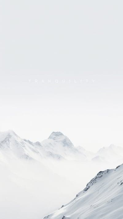Serene Snowy Mountain Landscape with 'Tranquility' Text