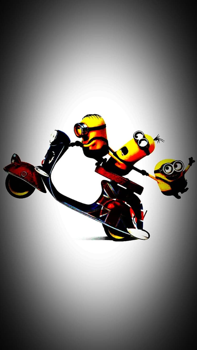 Three Minions with goggles ride a British flag scooter; one drives while two others cling to the back.