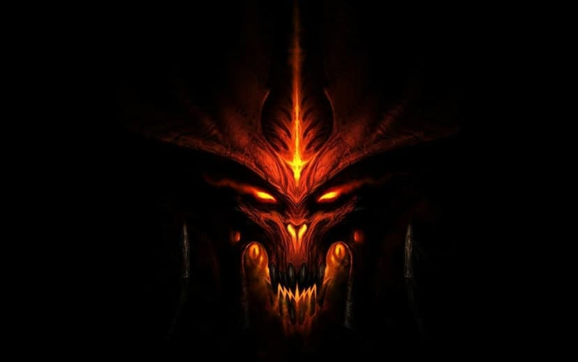 Fiery demonic face with glowing orange eyes and sharp teeth emerging from a pitch-black background in close-up.