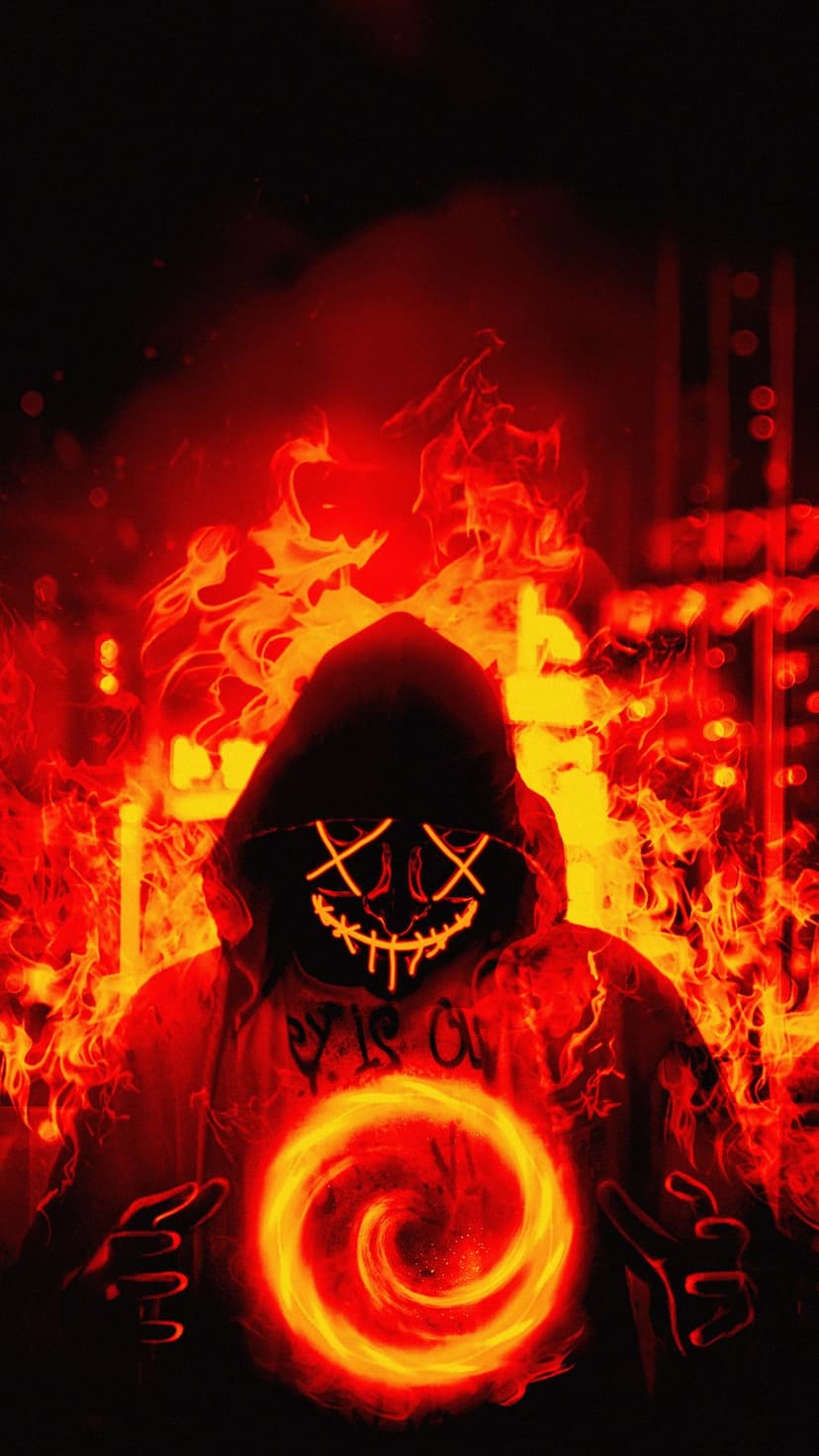 Hooded figure in a neon mask holding a swirling fire orb amidst orange flames and blurred urban city lights.