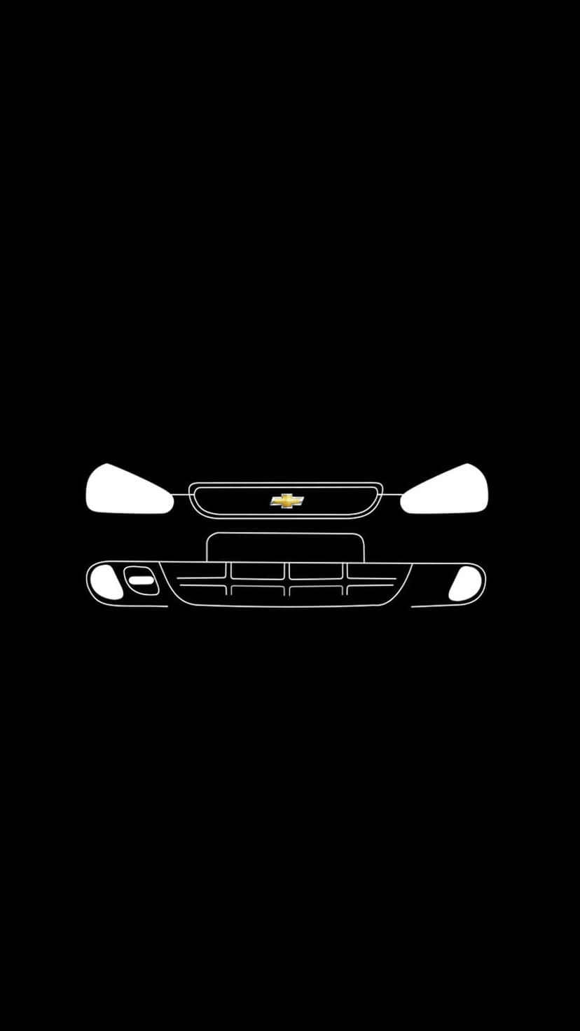 Chevrolet gold bowtie emblem centered on white line art depicting a car grille and headlights against black.