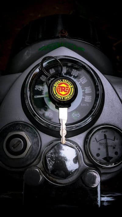 Royal Enfield Motorcycle Key and Dashboard Close-up
