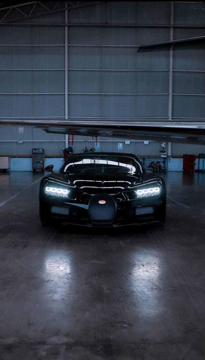 Dark Bugatti Chiron Aircraft Hangar Phone Background