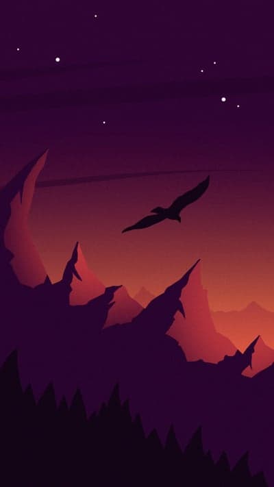 Soaring Bird Silhouette Above Jagged Peaks Sunset Background