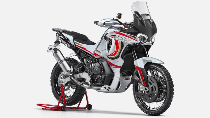 MV Agusta LXP Orioli adventure motorcycle with red and gold decals on a red paddock stand in a bright studio.