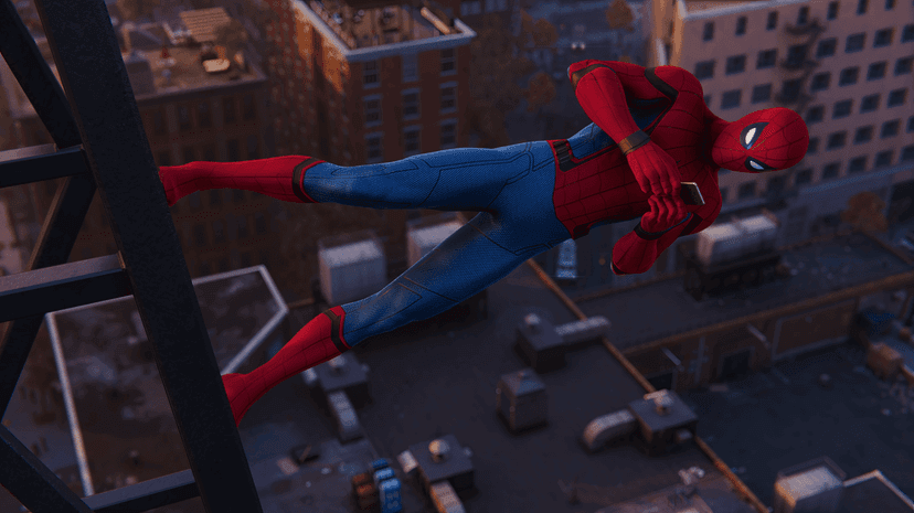 Spider Man hero crouching atop high skyscraper overlooking sunset city streets within cinematic video game scene.