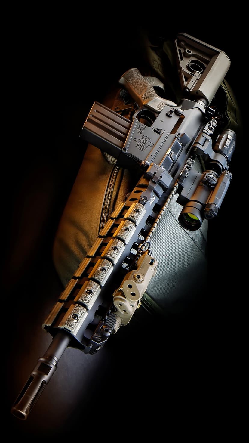 Matte black tactical AR-15 rifle with a precision scope and laser sight on a dark textured background.