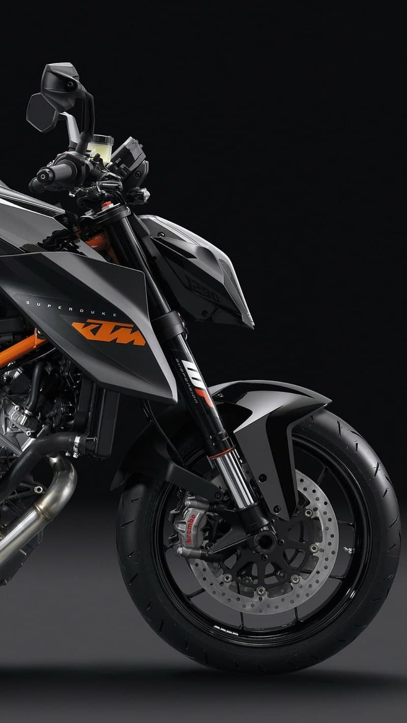 KTM Super Duke R motorcycle front section with orange logo, Brembo brakes, and black fairings on dark background.