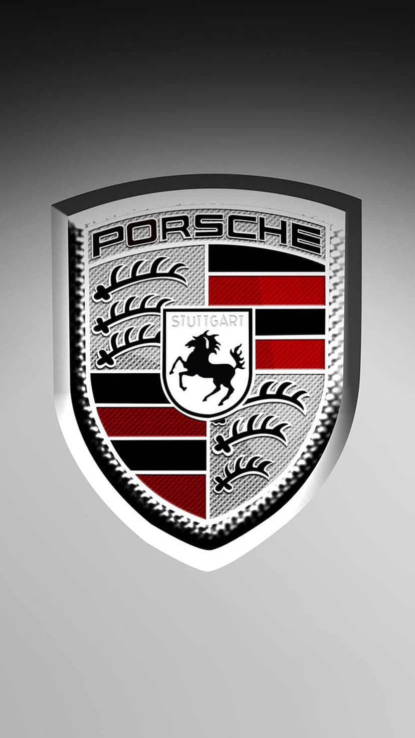Porsche shield logo featuring a rearing black horse and red stripes on a gold metallic 3D embossed surface.