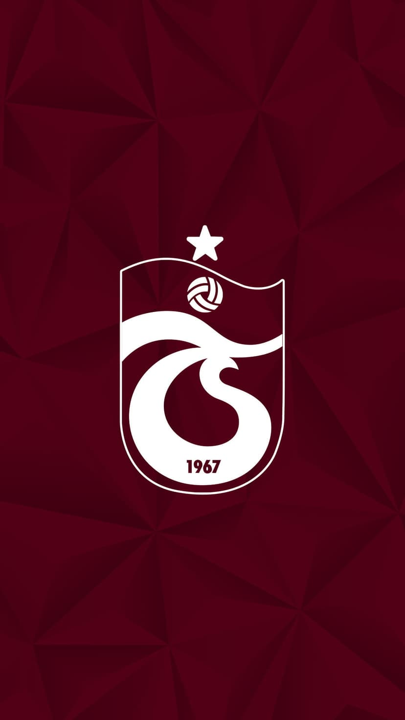 Trabzonspor 1967 crest with a star and football in white outline on a dark red geometric textured background.