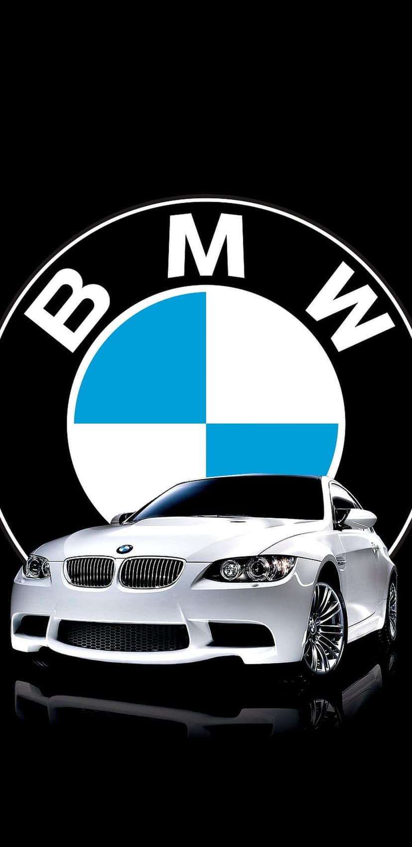 White BMW sports car with a visible logo and alloy wheels parked against a solid black studio background.