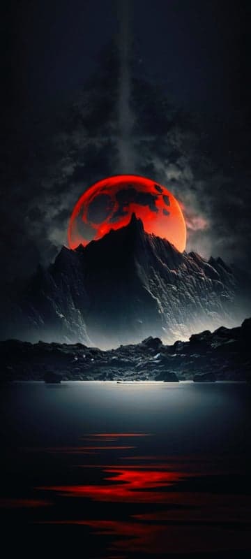 Crimson Lunar Eclipse Over Jagged Alpine Peaks Wallpaper