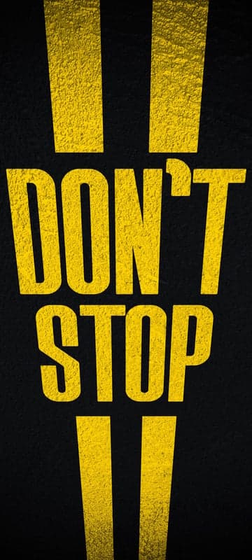 Inspirational "Don't Stop" Message with Bold Yellow Text