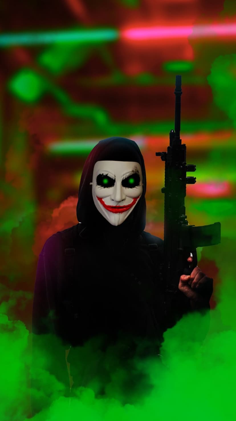 Masked jester with glowing green eyes holds an assault rifle as thick emerald smoke swirls in a neon city.