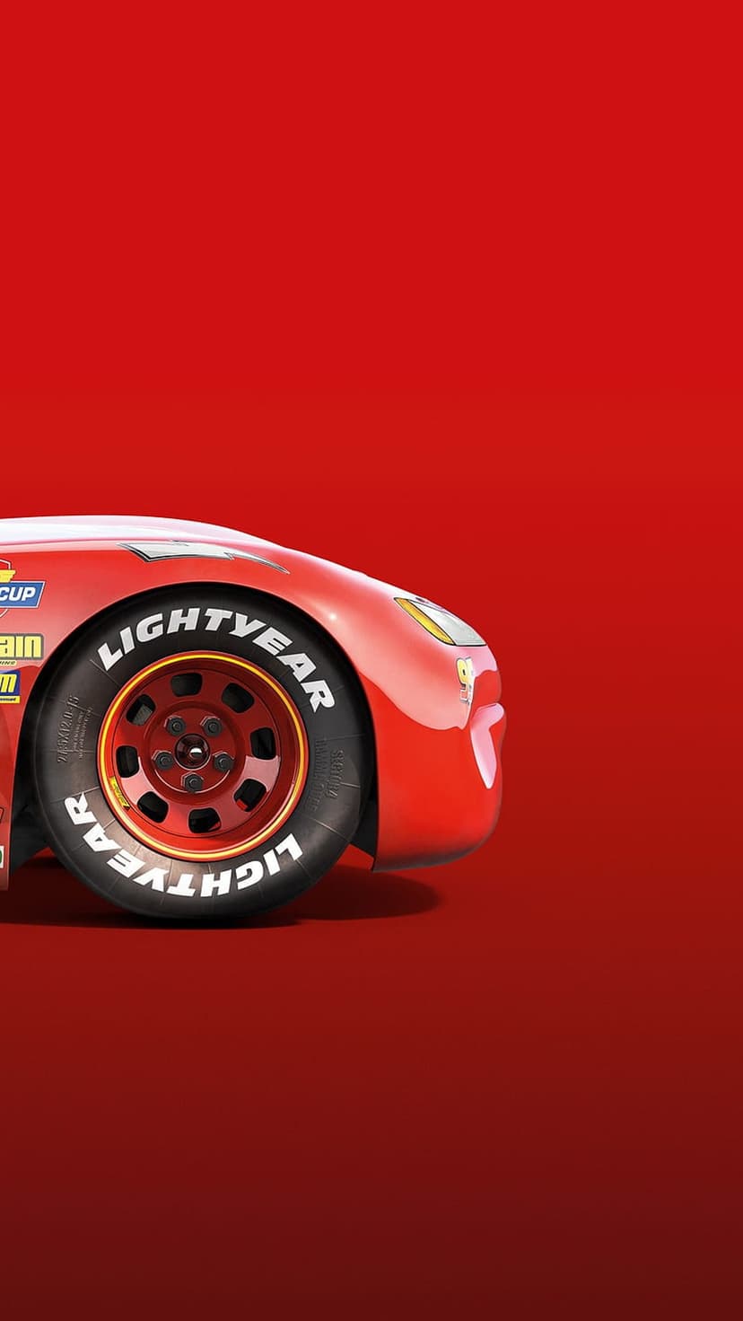 Lightning McQueen tire with yellow Lightyear text on a black rim against a textured red gradient background.
