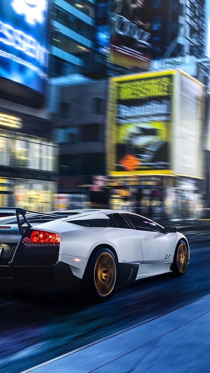 White Lamborghini Murciélago with red taillights racing through a neon-lit city street at night with motion blur.