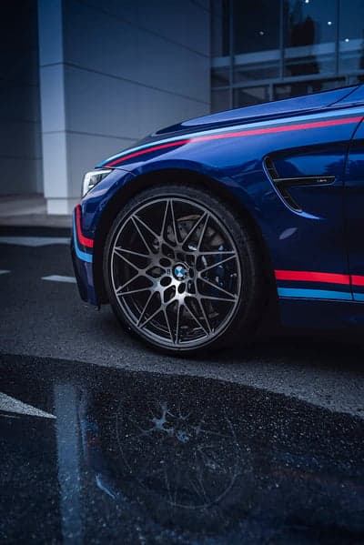 Blue BMW M4 Performance Sportscar Mobile Background