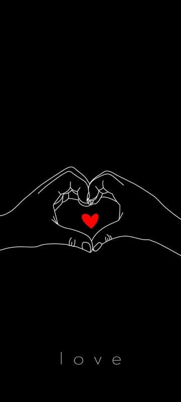 Hands forming a heart with a red heart and the word love