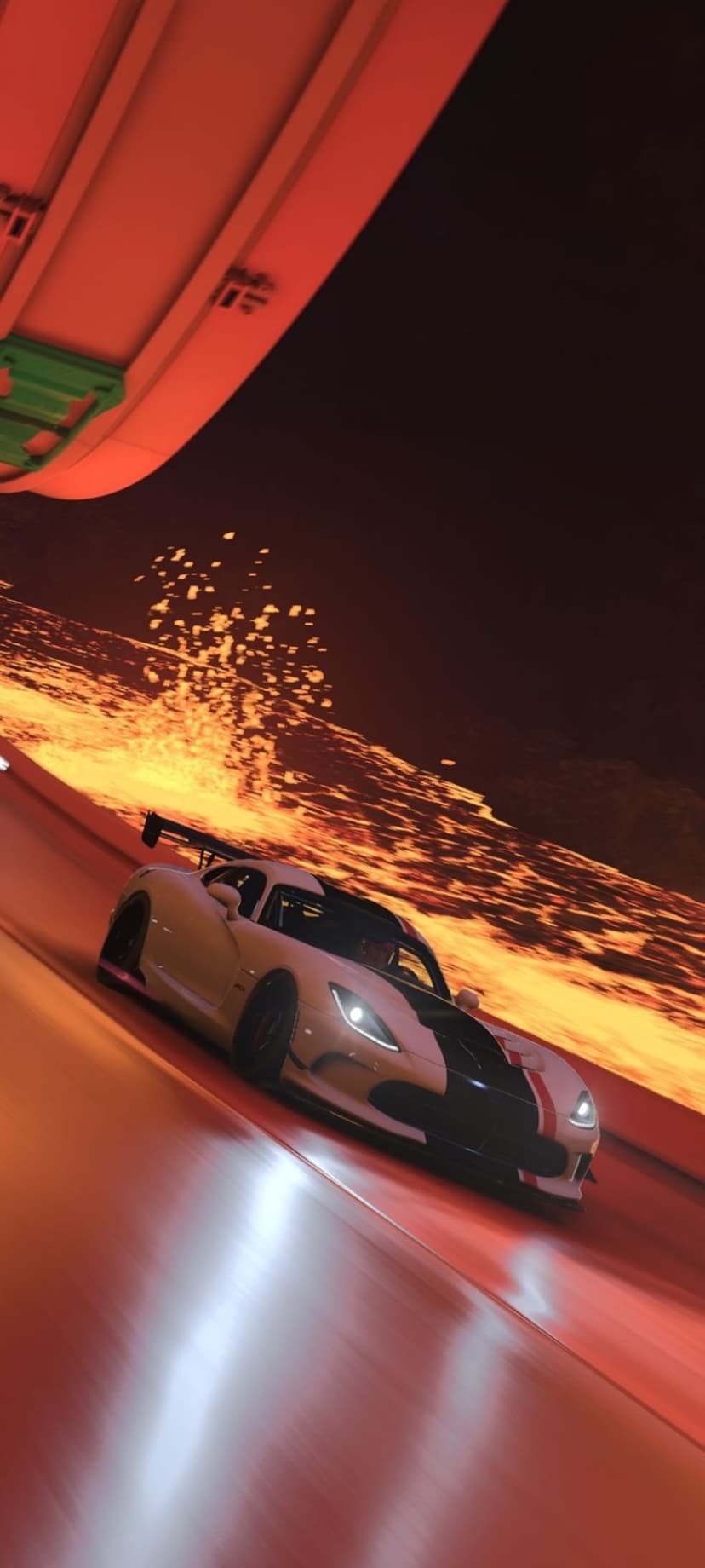 White Dodge Viper with black racing stripes speeds along a glowing orange track with flying sparks and embers.