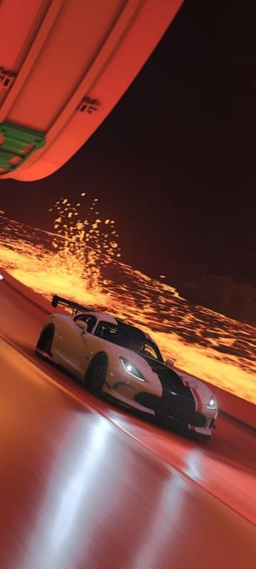 White Dodge Viper races on a fiery orange track