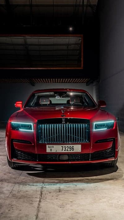 Red Rolls-Royce Ghost Luxury Car in Modern Garage