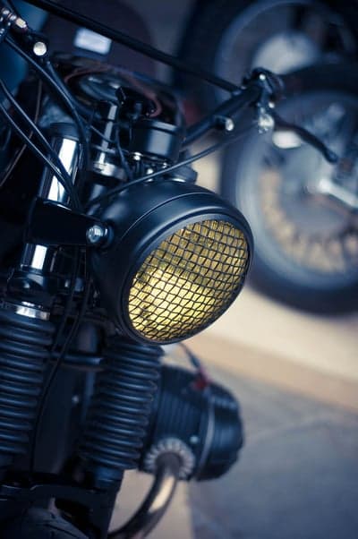 Vintage Motorcycle Headlight with Yellow Grille