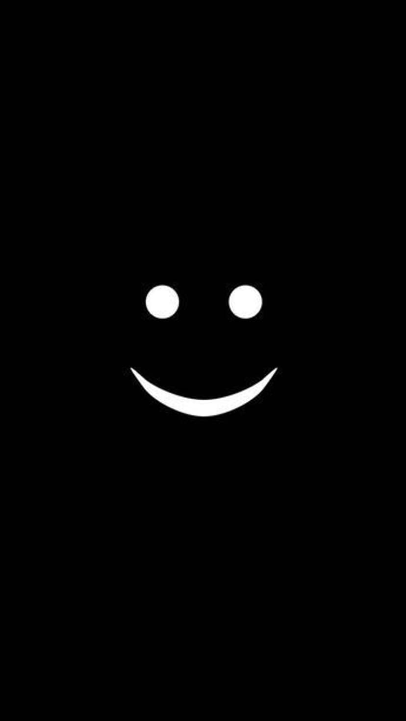 White smiley face with large eyes centered on a solid black background for high-contrast mobile display use.