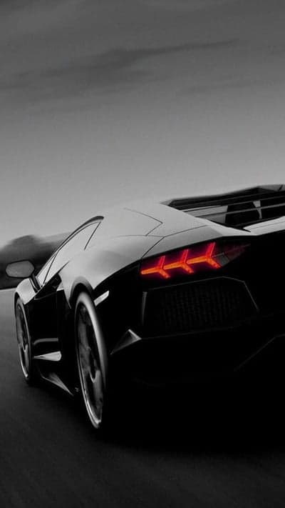 Sleek Black Lamborghini Aventador Tail Lights Blazing