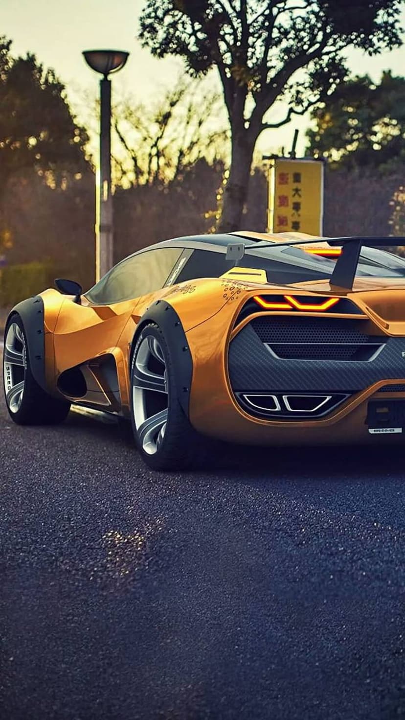 Orange futuristic concept car with a large rear spoiler and glowing red lights on a dark asphalt road at sunset.