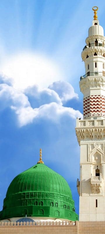 Green Dome and Minaret against a Cloudy Blue Sky