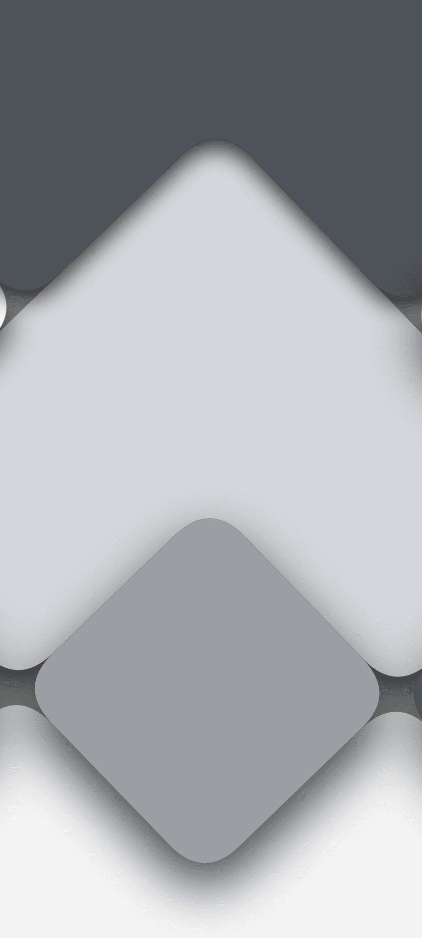 Overlapping rounded geometric shapes in shades of gray and white with soft drop shadows creating depth and layers.