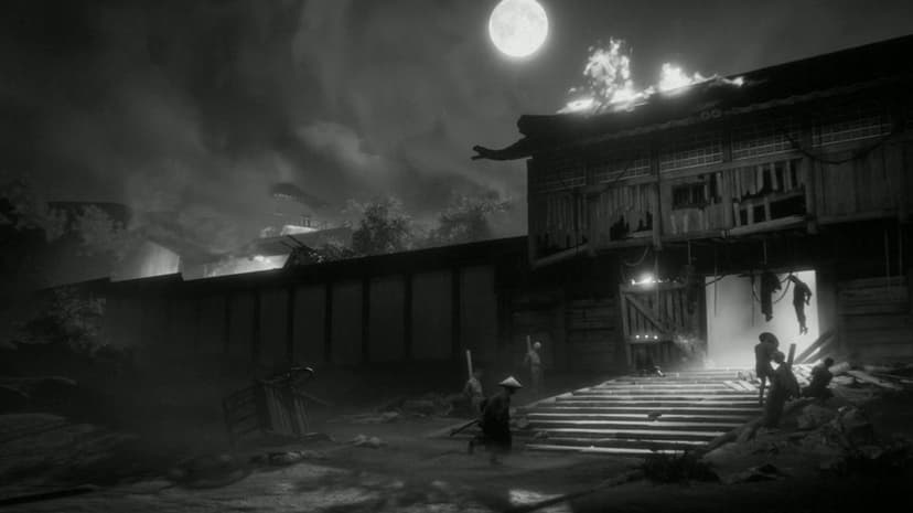A samurai runs toward a burning wooden gate at night under a full moon in a cinematic black and white scene.