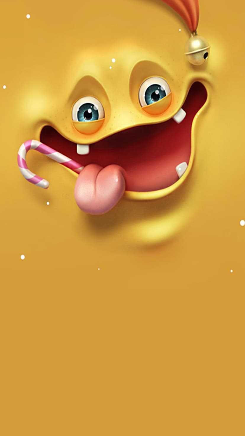 Yellow monster face with blue eyes holding a candy cane in its mouth with a small bell on its head.