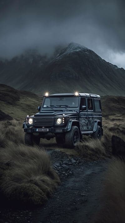 Black G-Wagon on Rugged Terrain