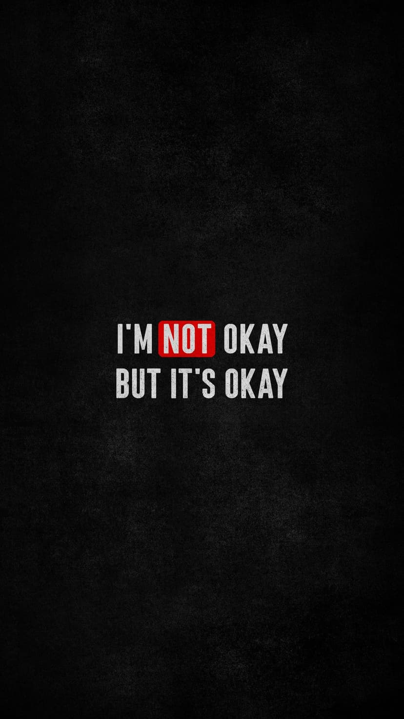 White text stating I'M NOT OKAY BUT IT'S OKAY with the word NOT inside a red box on a black background.