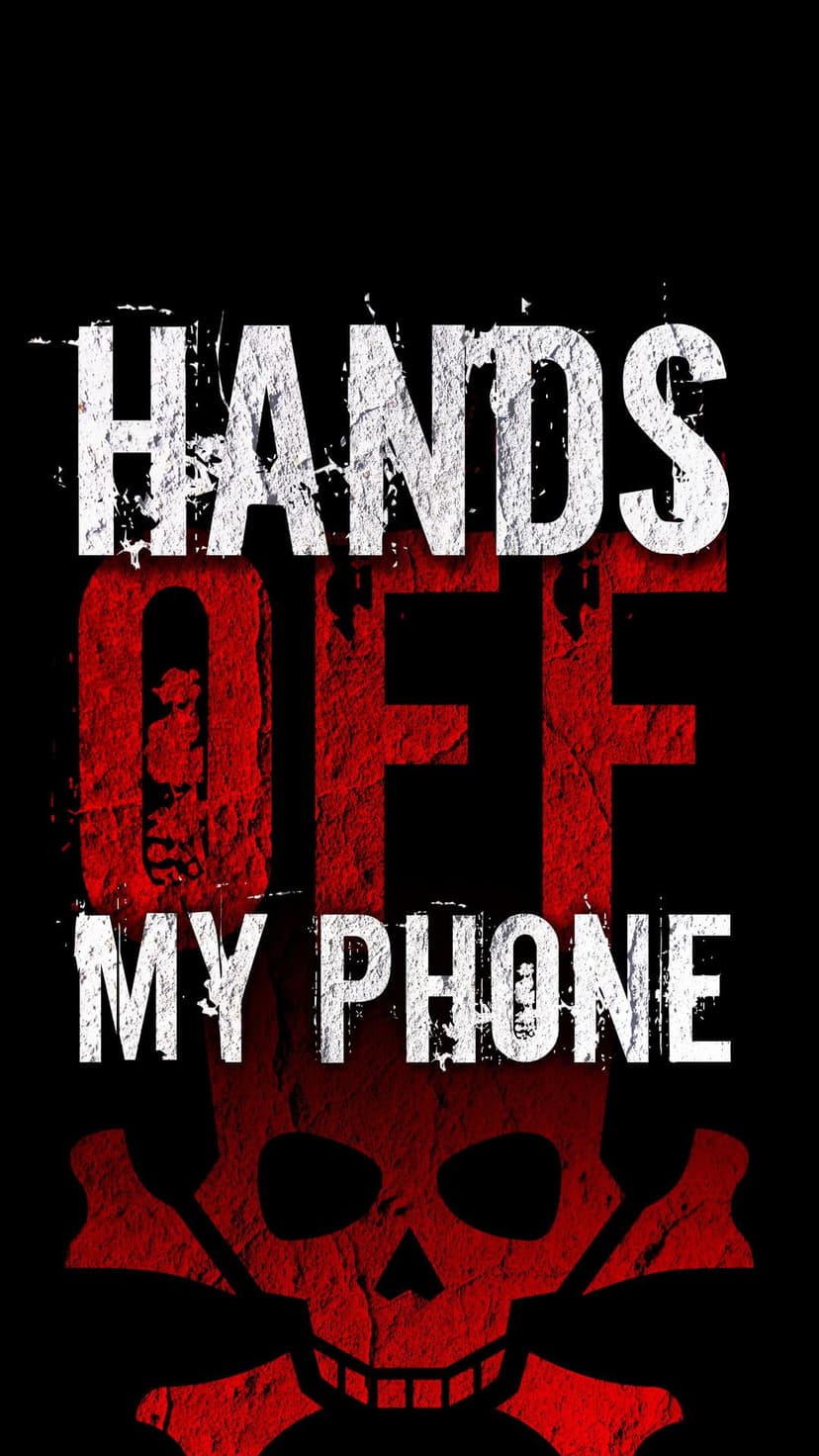 Weathered red skull and crossbones icon below distressed white text stating hands off my phone on black background.