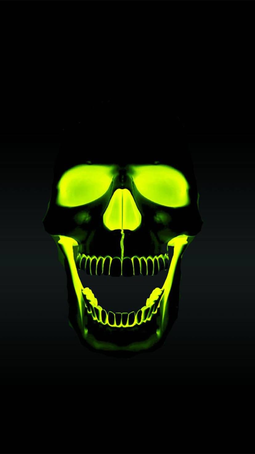 Neon green skull with luminous eye sockets and jawbone centered on a deep black background for high contrast.