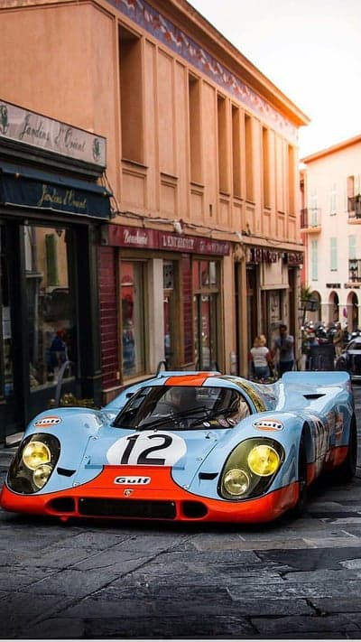 Vintage Gulf Porsche 917 race car on European street