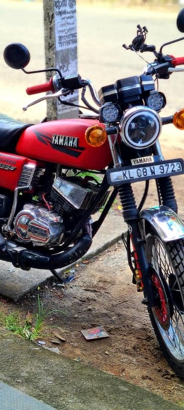 Vintage Yamaha RX 100 motorbike with custom modifications