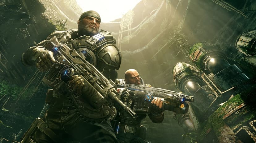 Marcus Fenix and a COG soldier hold Lancer rifles in a sunlit mossy cave with large industrial pipes.
