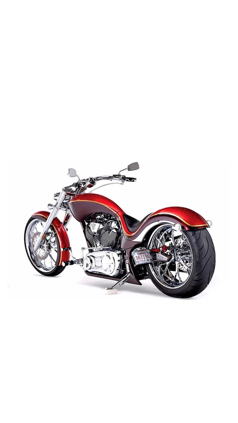 Red chopper motorcycle featuring polished chrome components and wire-spoke wheels in a vertical portrait view.