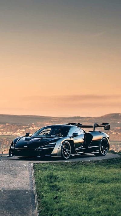 Stealth Black McLaren Senna Supercar Hilltop Background