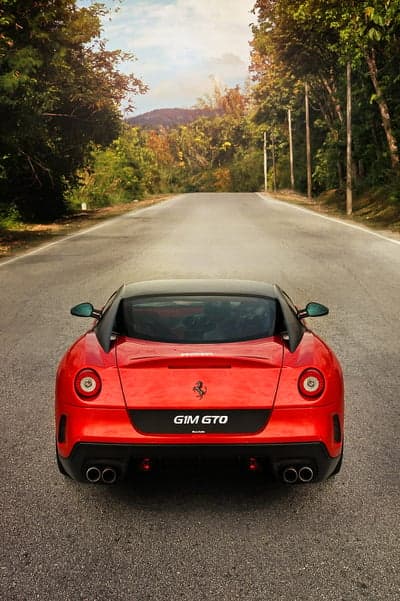Red Ferrari 599 GTO Rear View Mountain Road Phone Wallpaper