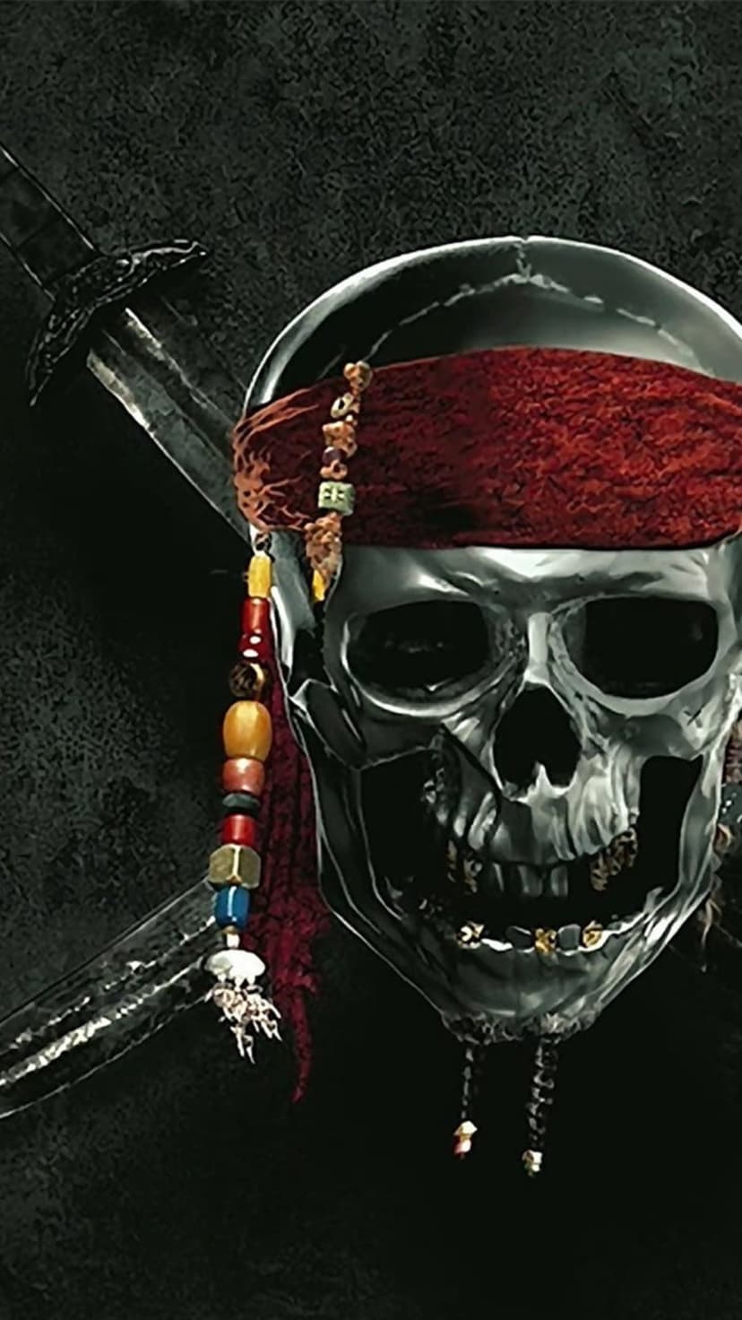 Metallic pirate skull wearing a red bandana and beaded necklace with an ornate sword hilt in the background.