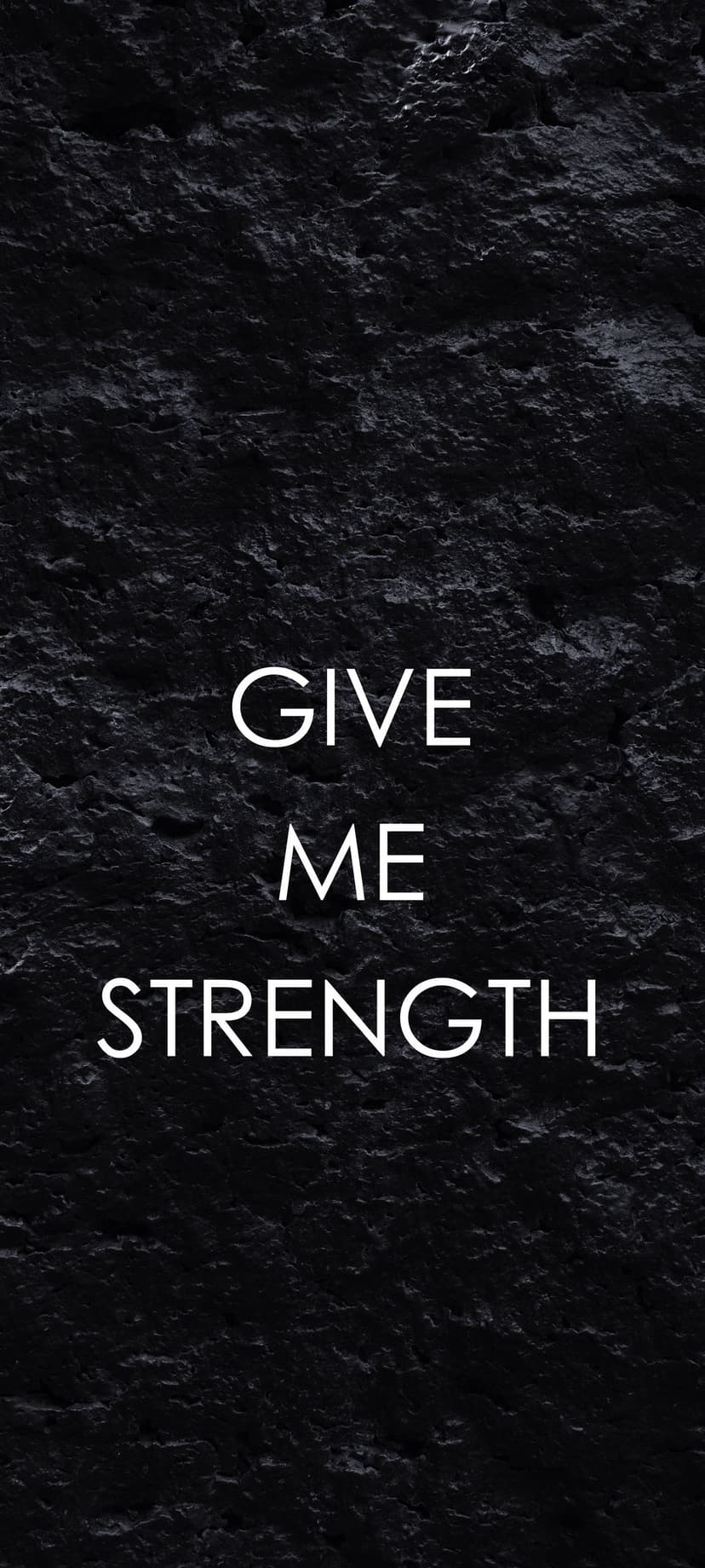 Give Me Strength quote in white sans-serif capital letters centered on a rough, dark charcoal textured surface.