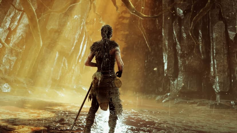 Female warrior with braided hair stands in a wet cavern filled with golden light and atmospheric dust.