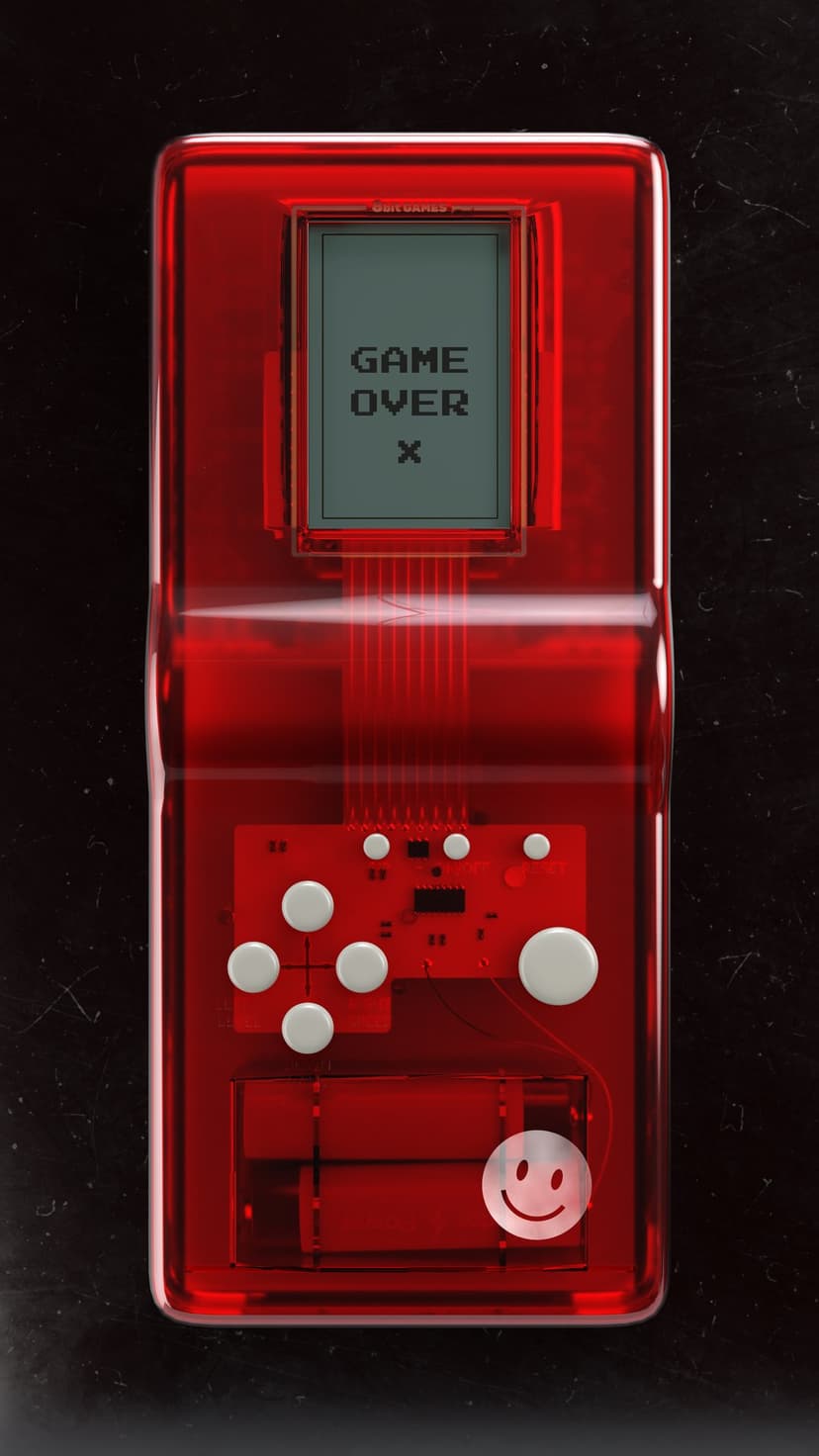 Red transparent handheld game console with visible circuits and a game over message on the liquid crystal screen.