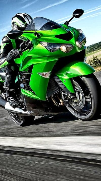 Green Kawasaki Ninja Rider Action Shot Mobile Wallpaper